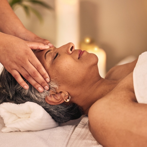 Woman, head massage and spa for beauty, skincare detox and healing zen therapy at cosmetic salon. F.